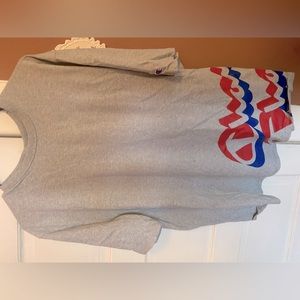 grey blue and red champion shirt